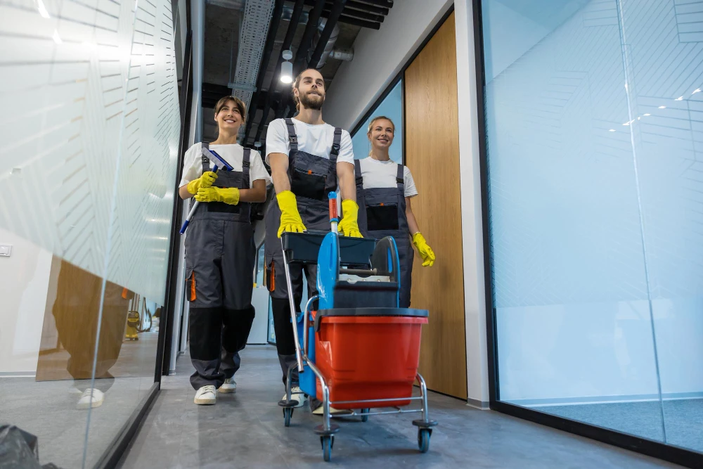 Commercial janitorial services in Toronto - Services Pro janitorial team with equipment in a Toronto facility corridor